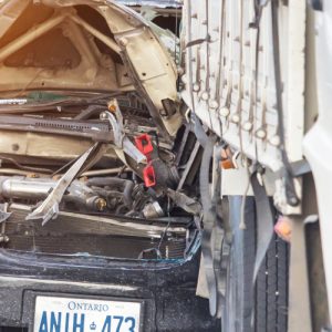 Car crashed into back of truck Car crashed into back of truck
